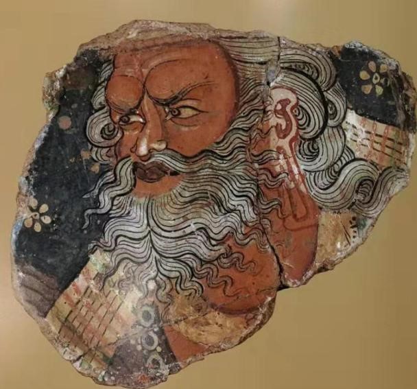 库车寺院遗址发现的6世纪初壁画残片,苦行者的腿部和头部